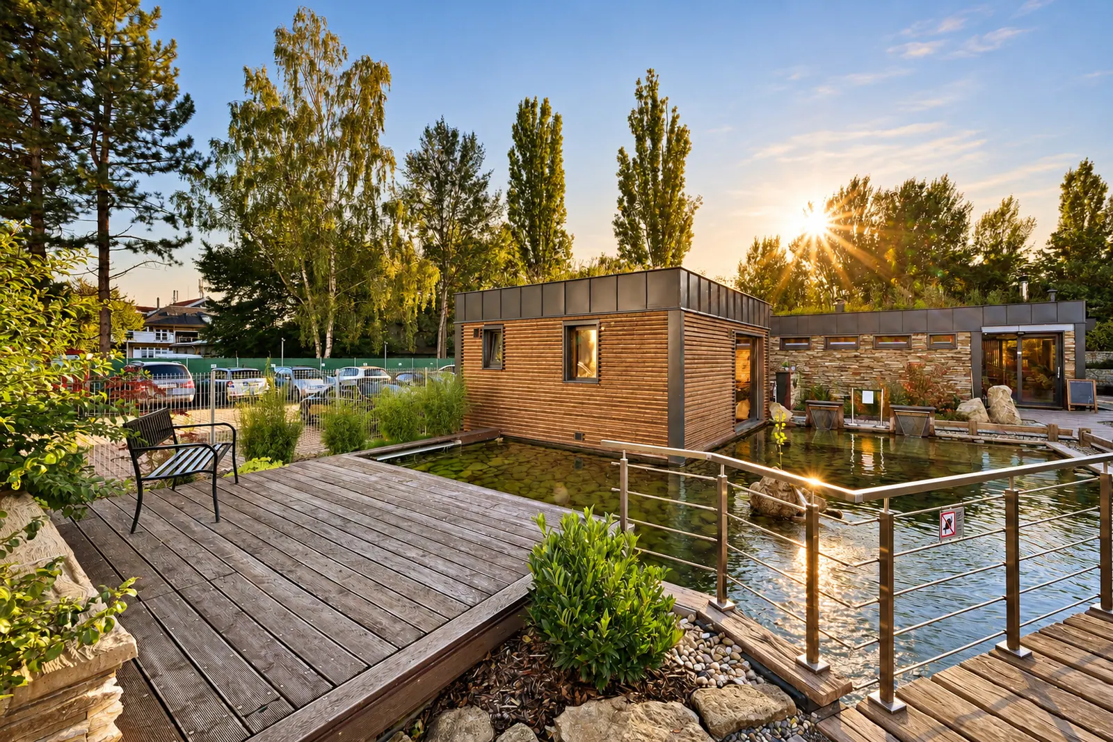 A sunny terrace with a pergola and seating beside the pool