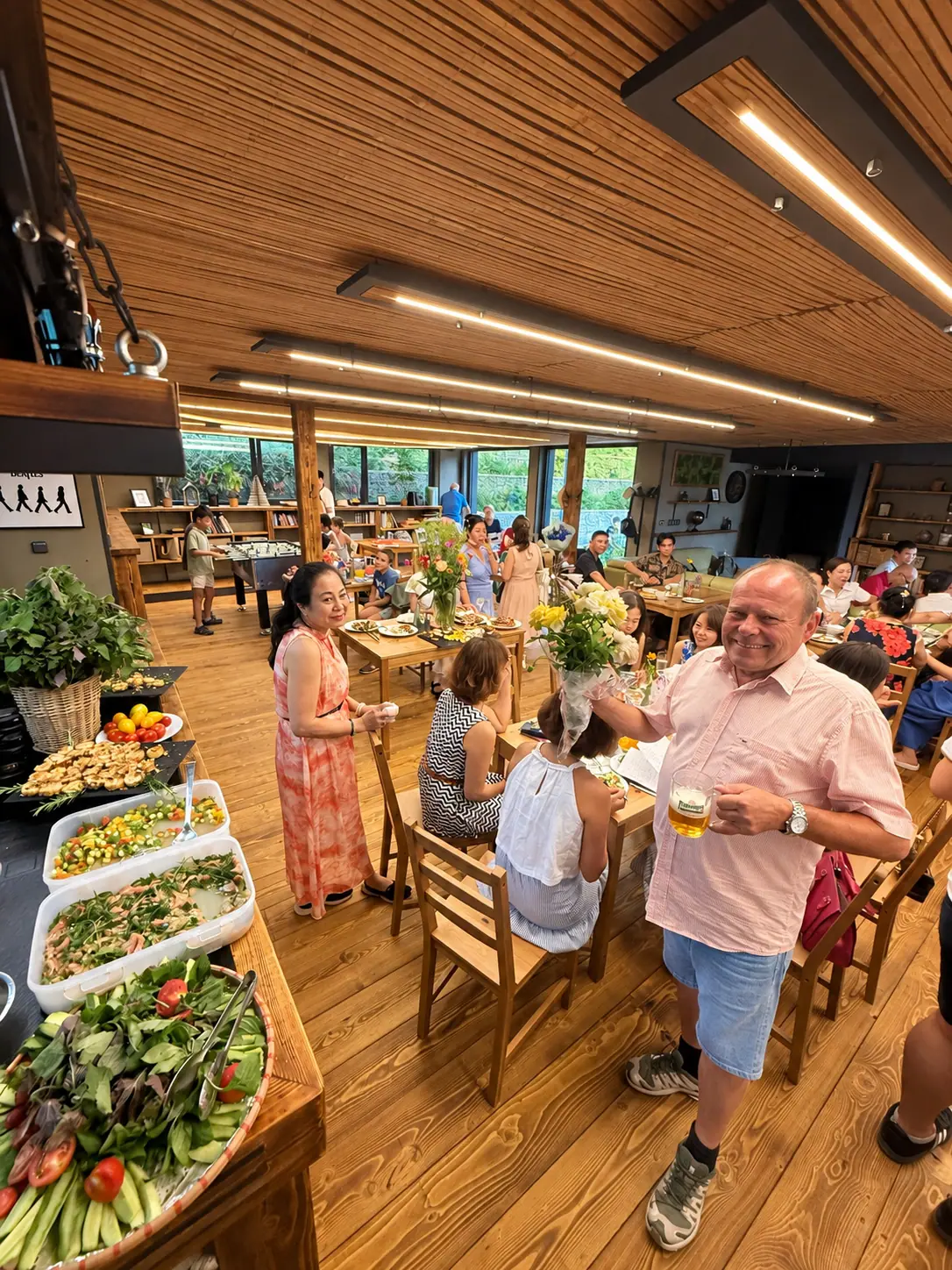 Guests at the tables and the buffet in the clubhouse