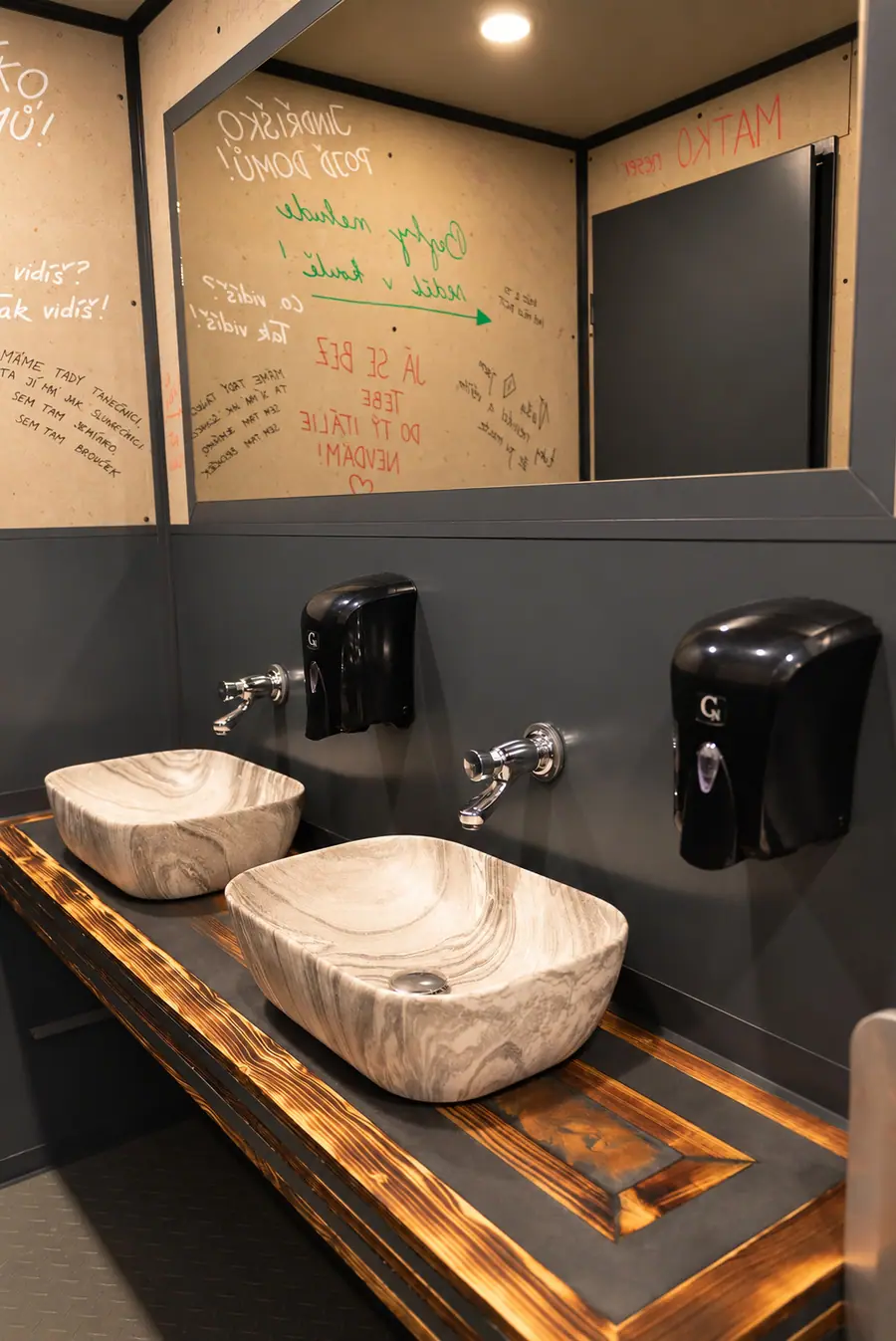 The washroom, with stone basins on a timber top