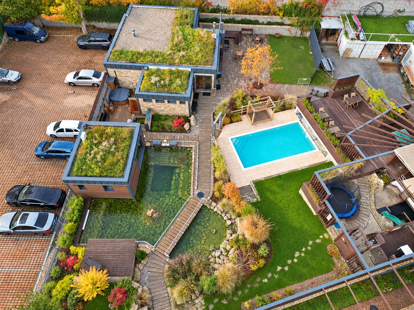 The grounds from the air — the pool, the pond and the green roofs